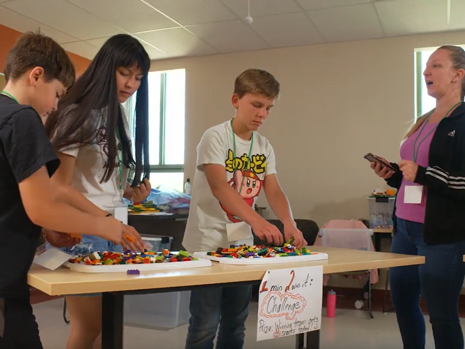 Campers competing in LEGO build